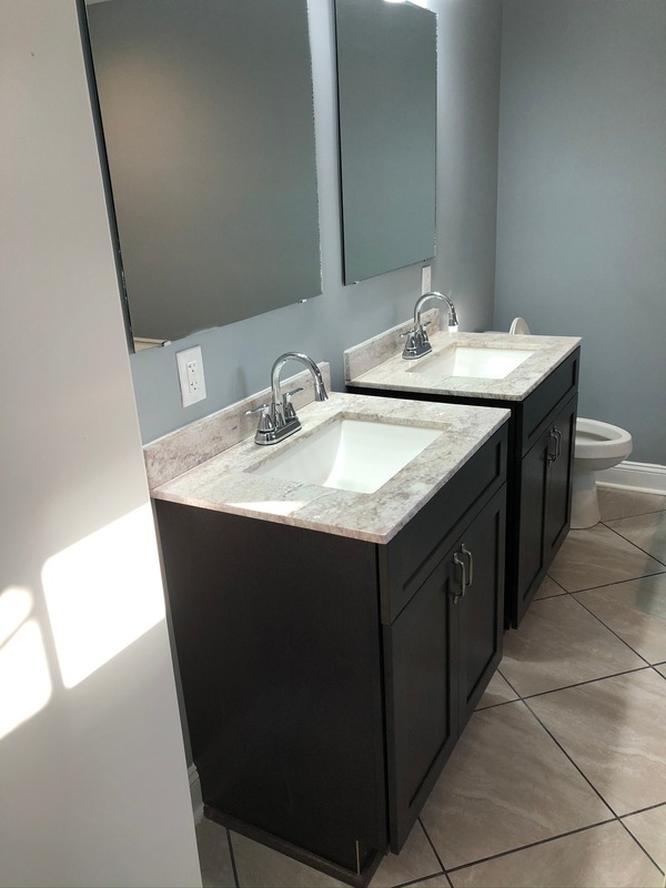 Bathroom fully restored after fire damage by Vigilant Restoration
